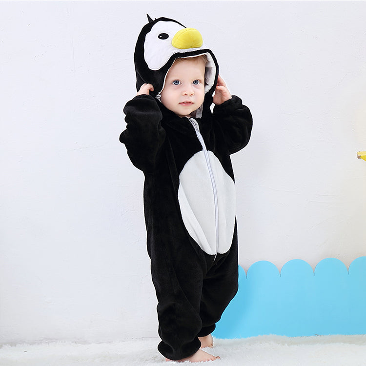 Adorable penguin onesie for kids, soft plush outfit with hood and flippers, perfect for playtime, bedtime, and fancy-dress fun.