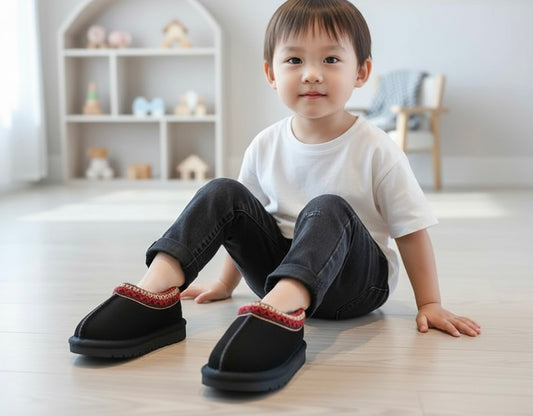 Adorable little kids Ugg-style boots, soft and cozy winter shoes designed to keep toddlers’ feet warm and comfortable